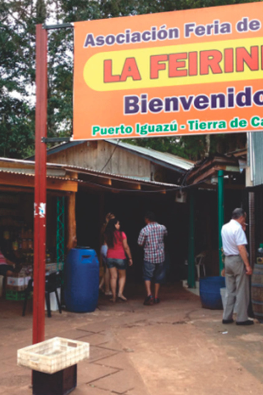 From Foz do Iguaçu: Puerto Iguazu Night Tour - The Feirinha and its Argentine food table