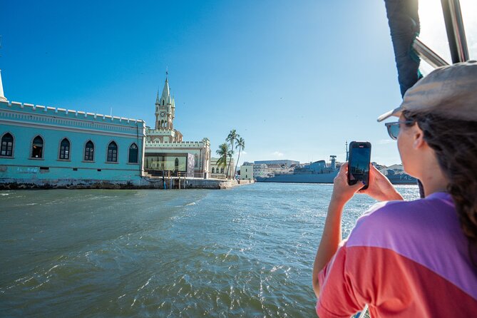 Sunset Boat Tour with Beer, Water, Soda and Snacks included - An Hour to Swim at Adão e Eva Beach